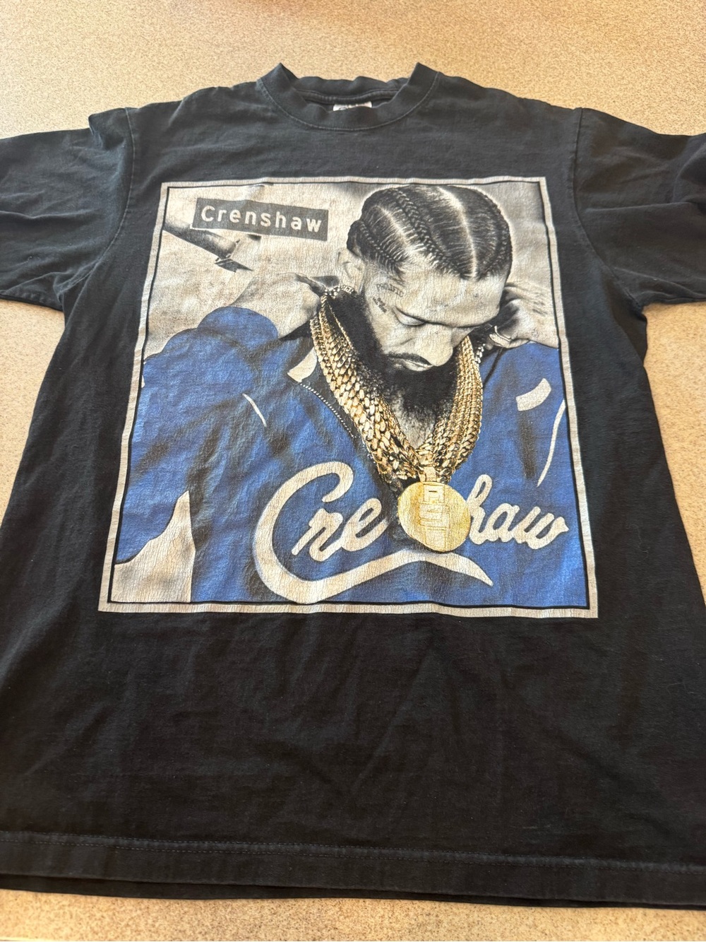 Size large Nipsey Hussle, black short sleeve T-shirt. Screen print front/ back.